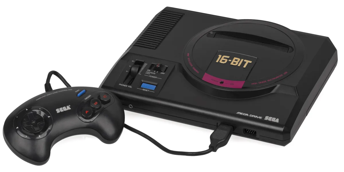 Una consola Sega Mega Drive con su mando de tres botones