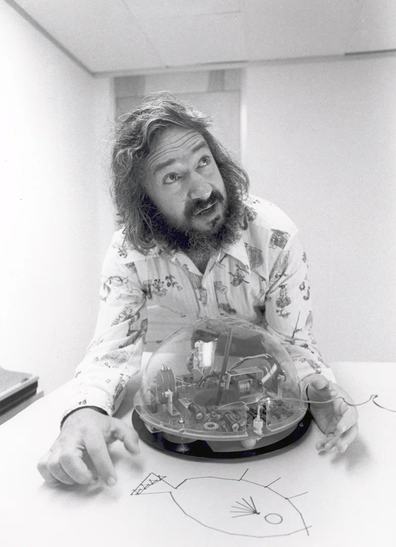 Retrato de Seymour Papert, con barba blanca y gafas