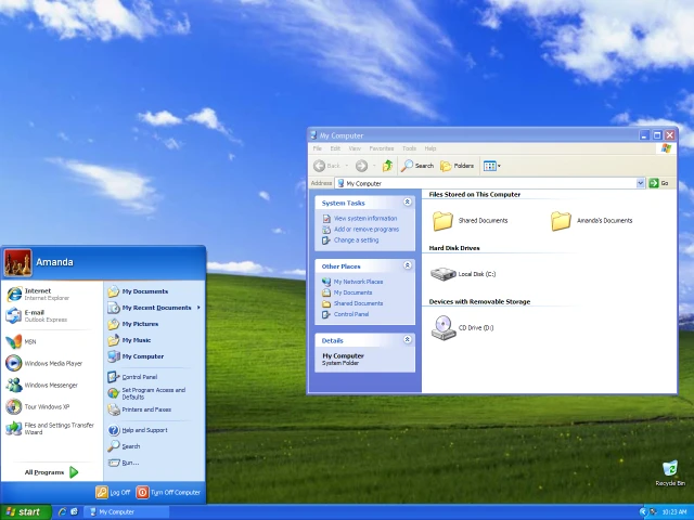 Escritorio de Windows XP con el tema Luna azul y verde, y el menú Inicio abierto